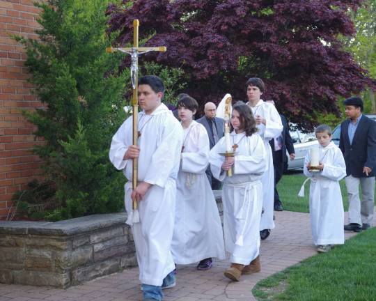 Pilgrimage of Fatima Statue leads to Highland Lakes Procession entering Our Lady of Fatima Church.