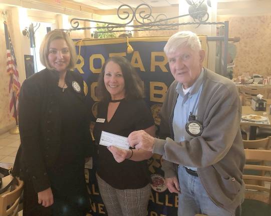 Past President, Alexis Horvath, Edith Lynch, Program Director of the Sussex County YMCA, and current President, Kenneth Wentink