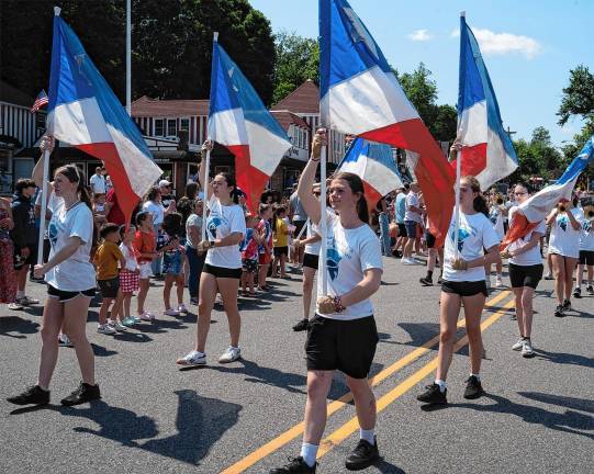 Sparta. Fourth of July events Members of the Sparta High School Color Guard march in the parade.
