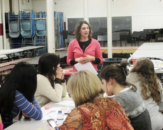 Wantage school builds bonds between students and parents Photo by Viktoria-Leigh Wagner Prevention Specialist and Health Educator at the Center for Prevention and Counseling Tina Aue speaks with local parents.