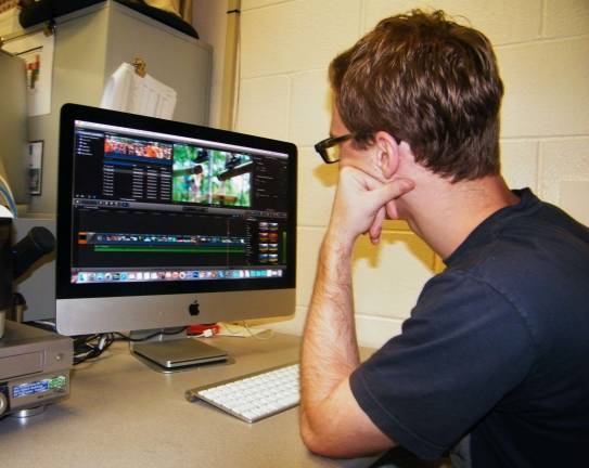 High Point Regional High School junior Garrett Fenlon is shown video editing.