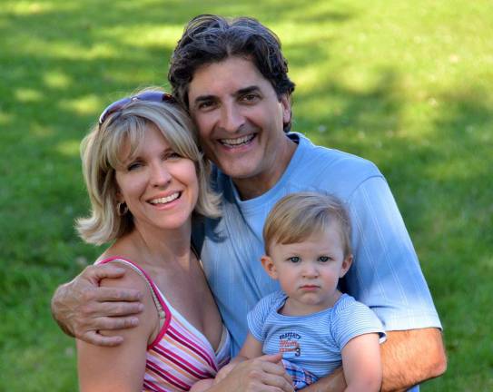 Singing for a Cure An early family photo of MS patient Faith Anderson, her husband, Jon Hartlage, and their son, Darios James Hartlage, soon after he was born six years ago and around the time Anderson began experiencing the symptoms of her affliction