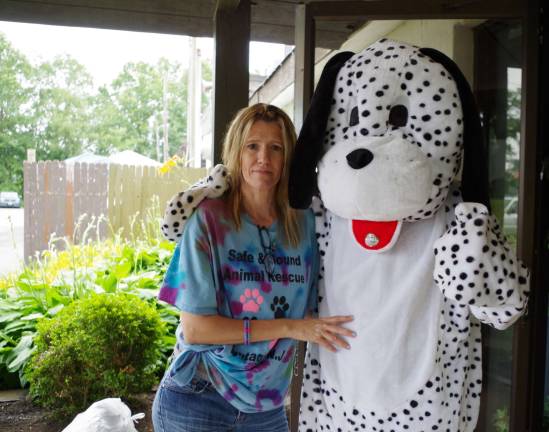 Karyn Pirl of Wantage-based Safe and Sound Animal Rescue poses with &quot;Dippy the Dalmation.&quot; Photo by Chris Wyman.