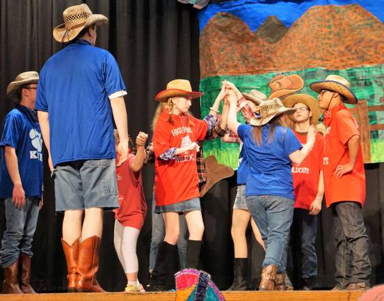 Students square dance during the big finale, &quot;Thank God I'm a Country Boy!&quot;