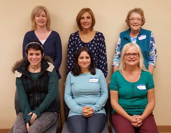 Volunteers graduated English program Top (Left to right): Erin MacVane, Nancy Kempf, Caroline Mangione, Bottom. from left: Cassandra Mainiero, Lenore Davis, Wendy Shoemaker-Hann. Two graduates not in the picture are: Carrin Krushewsky and Patti Spyer.