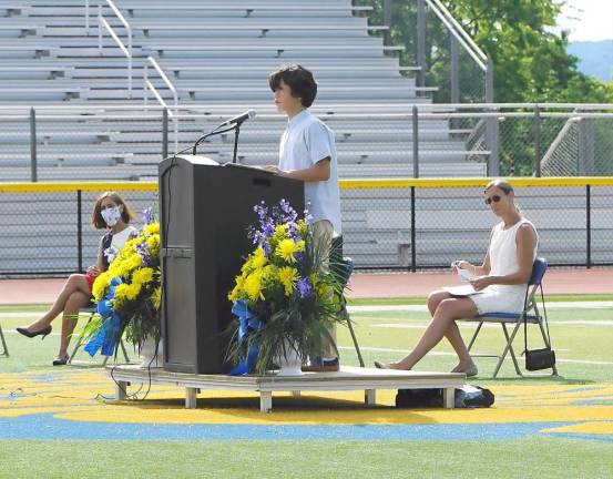 Daniel Kim reads his essay. (Photo by Vera Olinski)