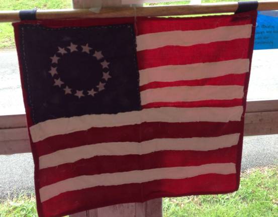 Middle School students celebrate Colonial Day The colonial flag.