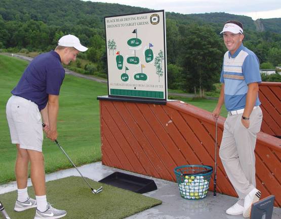 Black Bear hosts Bourbon, BBQ party Nick the Taylormade Golf Instructor gives FREE golf lesson to Jake.