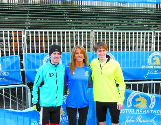 Locals finish strong at Boston Marathon Jeremy Scheid, Laura DeLea and Justin Scheid (the day before the Marathon).