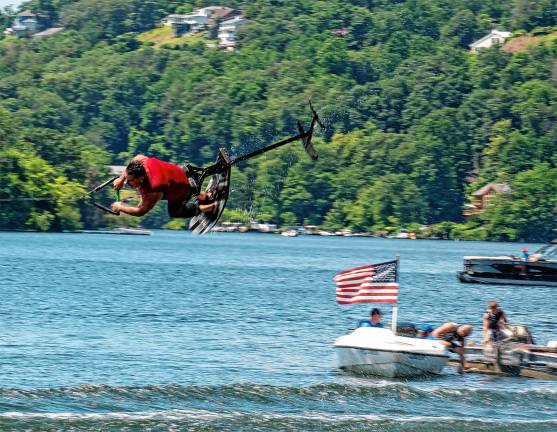 Sparta. Fourth of July events Damon Jenkins flips on the hydrofoil during Lake Mohawk Ski Hawks performance Friday afternoon, July 4.