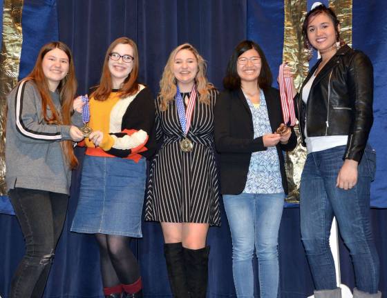 The proud winners, from left, McKayla Van Orden and Blake Harrch, tied for second place, Sidney Sparta, first place, and Caly Simeone and Valerie Cabrera, tied for third place in the Ninth Annual Poetry Out Loud competition at Vernon Township High School. Sparta will compete in the regional competition in Morristown next month.