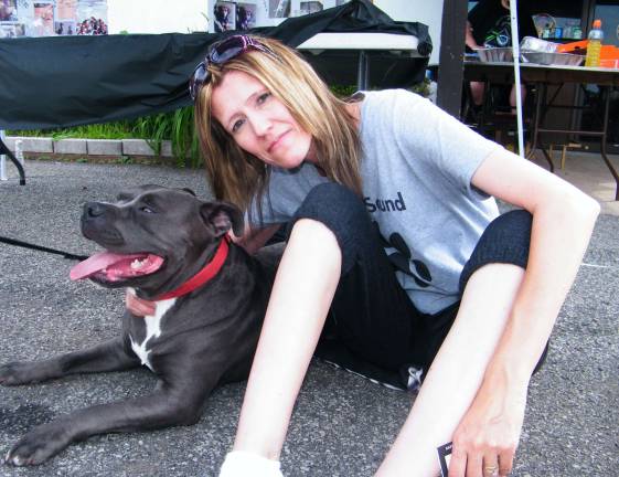 Safe and Sound Animal Rescue founder and owner Karyn Pirl of Wantage is shown with Goofy, a deaf pitbull that was rescued by the organization two months ago