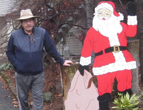 John Westermajer poses with his Santa creation.