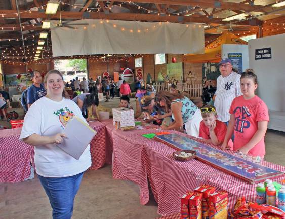 Shoprite at the fair Katie Pascale (Blairstown) spins the ShopRite wheel for a chance to hopeful fairgoers to win prizes and snacks.