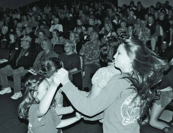 'Beatlemania Now' hits High Point stage Photo by Nicholas Ortiz Concert-goers enjoying the tunes.
