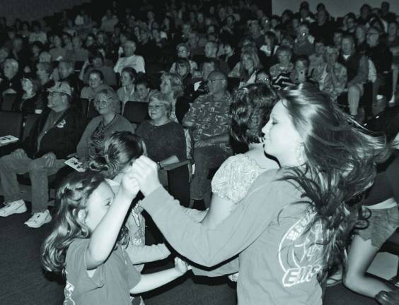 Photo by Nicholas Ortiz Concert-goers enjoying the tunes.