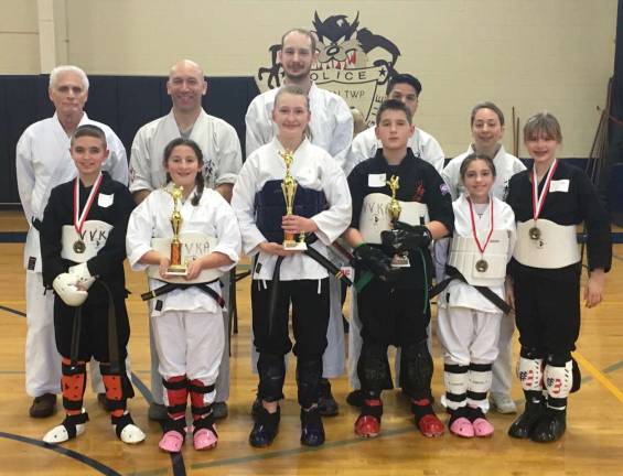 2) Receiving their awards in the advanced Kumite competition are Wade Riley, Ashley Antonini, Dannica Williams, Elijah Fischer, Erin McDonough and Jacqueline Schels. Judging the competion were Sensei&#xfe;&#xc4;&#xf4;s Chuck Ercolano, Paul Doumanis, Barret Myzak, Jose Gomez and Jillian Banks.