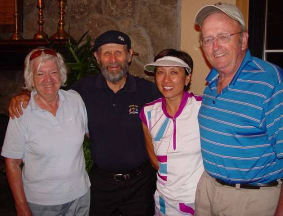 9 & Dine event boasts winners, 80th birthday The “Birthday Boy” J.B. Robertson (in the black hat) celebrates his 80th birthday at 9 & Dine with wife and friends.