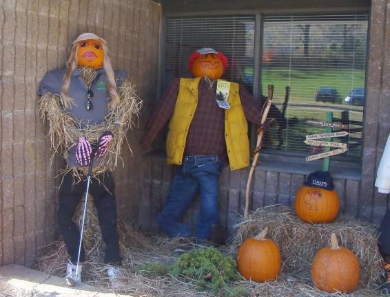 The Municipal Building elaborated on Vernon's status as a four season recreational community with scarecrow golfer and scarecrow hiker.