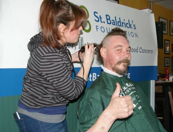 Paul Fredette of Vernon gets a &#xfe;&#xc4;&#xfa;little taken off the top&#xfe;&#xc4;&#xf9; haircutter Maureen Pezzotta of Pro Haircutters of Rockaway.