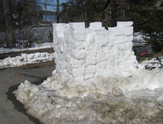 PHOTO BY JANET REDYKE This snow fort or snow castle was constructed by a snow artist after the March foot and a half snowstorm. It stands as sentinel on Lakeside Drive West in Highland Lakes.