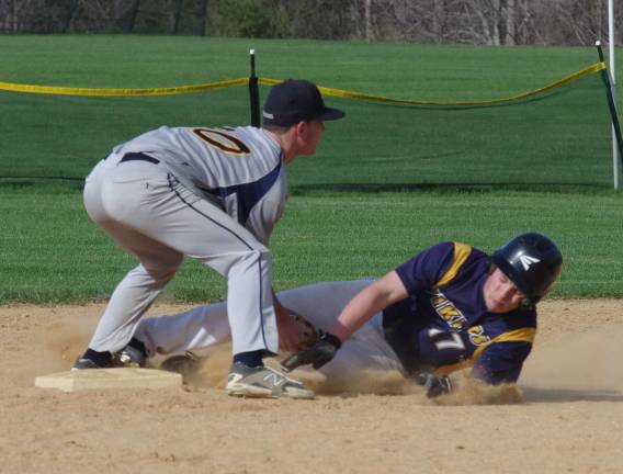 Jefferson's Brian Turton tags out Vernon's Anthony Germinario at second base in the fourth inning.
