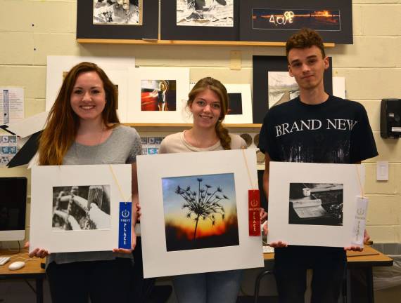 Student winners in the Vernon Township Historical Society photography exhibit are, left to right, first-place winner Brooke Graniere for her work entitled, &quot;Winter&quot;; second-place winner Heather Morris for her photograph entitled, &quot;Queen Anne's Lace&quot; and third-place winner Robert Martis for his photograph entitled, &quot;Book Smart.&quot;