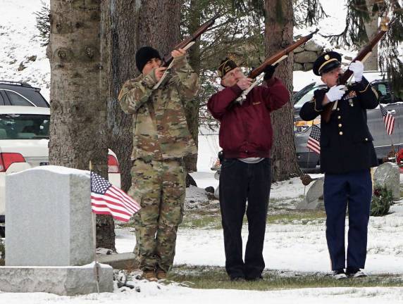 The VFW Wallkill Valley Post #8441 shoots a three volley salute.