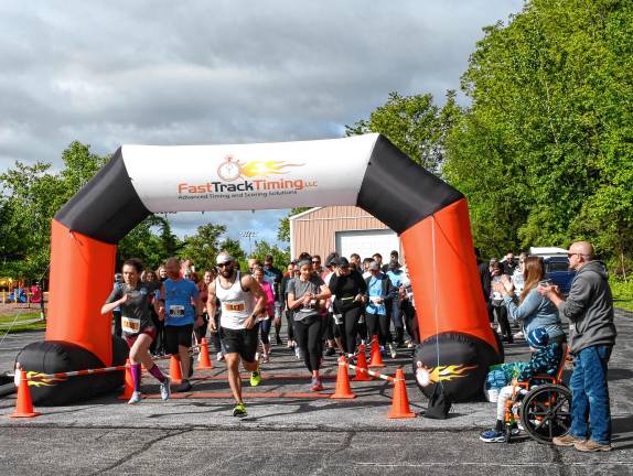 Photos: Vernon Spring 5K <b>Participants in the Vernon Spring 5K set off Saturday, May 24 at Maple Grange Park. </b>