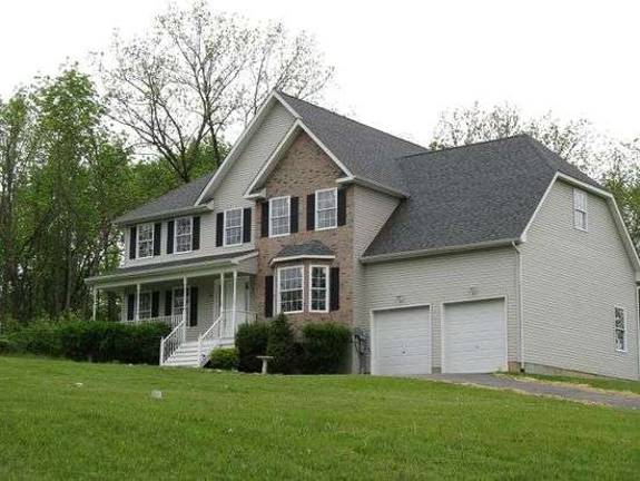 Photo courtesy of Zillow.com A photo of the 33 Grumm Road home before it was leveled by an explosion.