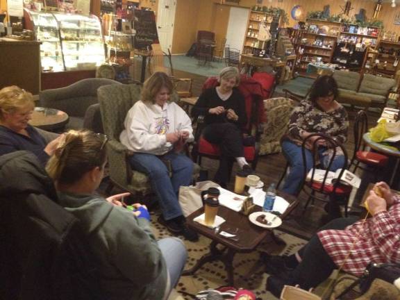 Photo provided Louise Murphy of Franklin (shown in the white sweatshirt) leads the Toasty Noggins chapter of Crochet for Cancer where local women crochet hats for infants and those battling cancer.