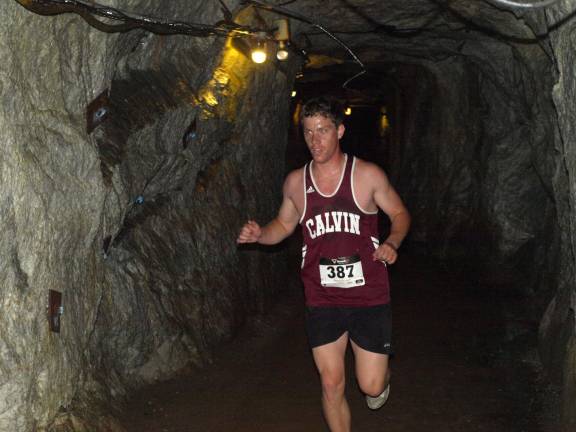 Ben VanWyk of Sussex runs the underground portion of the Ogdensburg 5K race Saturday morning.