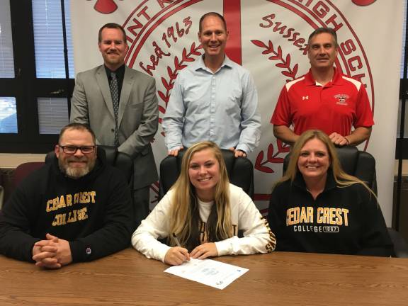 High Point's Jordan Cicio, seated middle, will continue her soccer career at Cedar Crest College. Pictured with Jordan are, seated, father Brad and mother Betty. Standing from left to right are Principal Jon Tallamy, Head Girl's Soccer Coach Aaron Berger, and Director of Athletics and Assistant Principal Todd Van Orden.