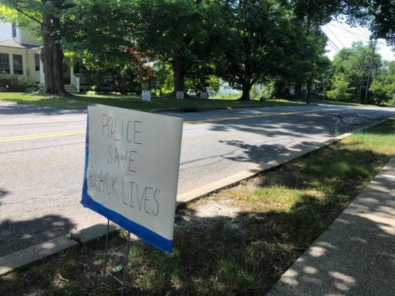 Residents see ‘coded racism’ in firehouse sign A pro-police sign across the street from Black Lives Matter signs on Forester Avenue.