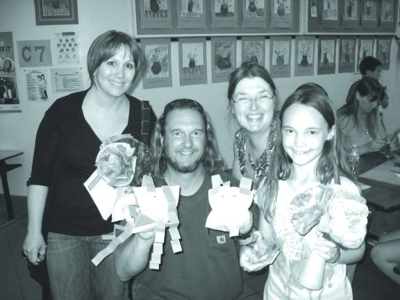 Paper Sculptures take center stage at Family Art Night The Palmer Family and Portner.