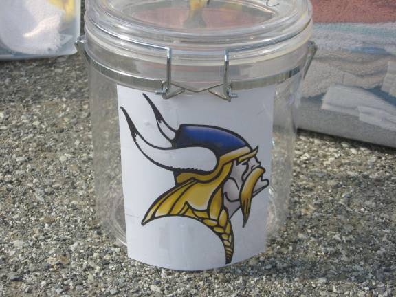 The Vernon Viking donation jar stands waiting for dollars and spare change.