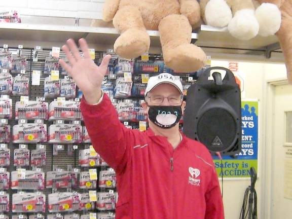 WSUS radio DJ Steve Andrews was a familiar face during this year’s Stuff the Bus food collection as he has been for the past 13 year (Photo by Janet Redyke)