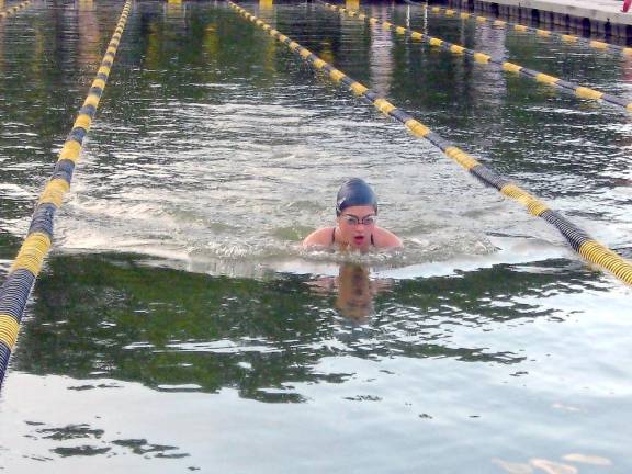 Kayla Jurewicz breaststrokes her way through 50 meters (Photo by Janet Redyke)