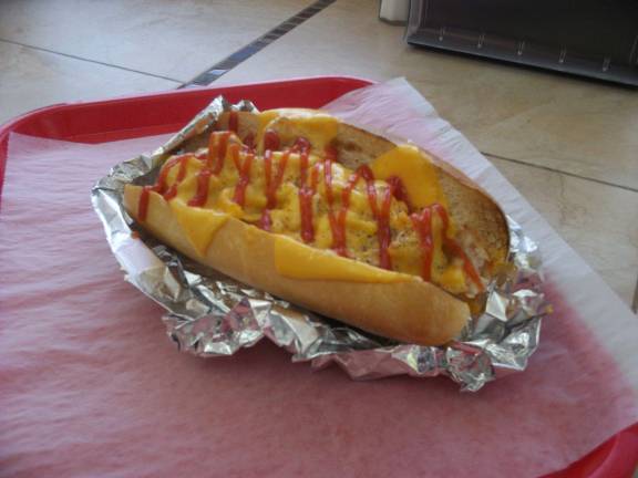 The namesake &quot;Jersey Dog features a hot dog wrapped in Taylor ham, topped with cheese and crumbled hash brown.