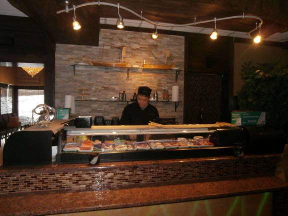 Wings Asian Fusion Bistro opens in Vernon A sushi chef, hailing from Japan, freshly prepares rolls.