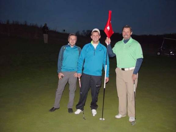 The sudden death playoff Team Ballyowen winners Rob Zimmerer and Jamie Connelly with Mark Melillo on the 18th hole.