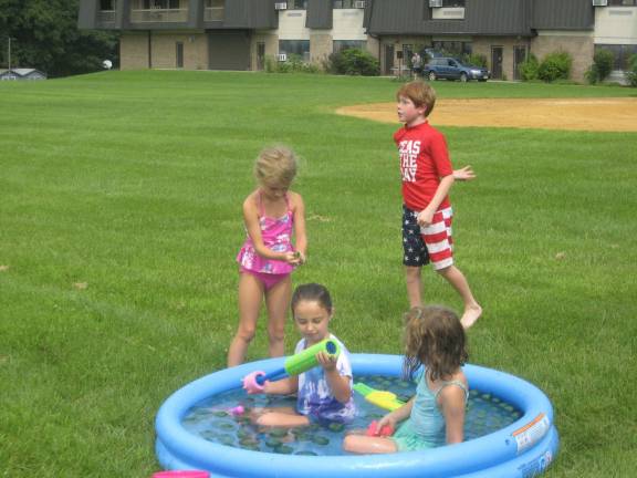 Youngsters cool in the pool at the Water Palooza sponsored by the Vernon Fire Department. Photos by Janet Redyke