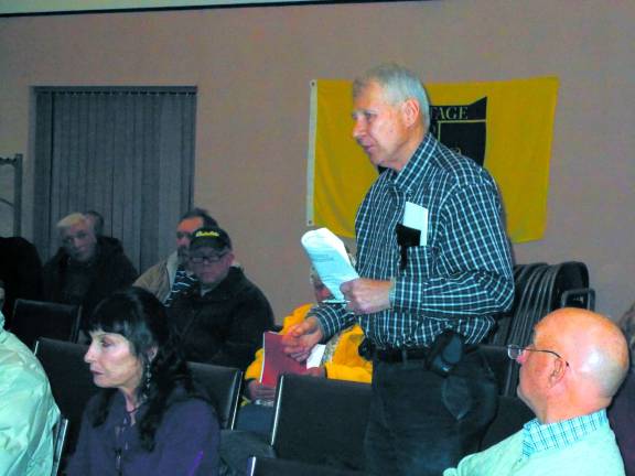 Photo by Vera Olinski Thomas Jable, chairman of Friends of Lake Neepaulin, speaks at a recent Township Commiteel meeting.