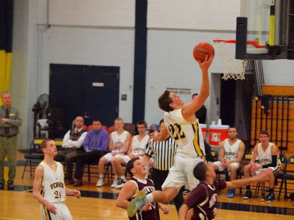 Newton routs Vernon, 72-44 Vernon's Luke Venskus (22) goes high in the sky. Venskus contributed 9 points for his team.