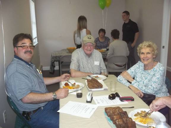 Ray Ganz, Tom Davis and Lillian Pepe at grand opening celebration.