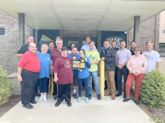 Vernon Township Police receive plaque from local Special Olympics teams Local Special Olympics teams, the Vernon Express/Sussex Rollers.