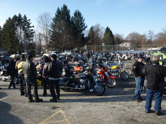 Van drives into motorcyclists Riders gather in the Ogdensburg Firehouse parking lot Wednesday morning.