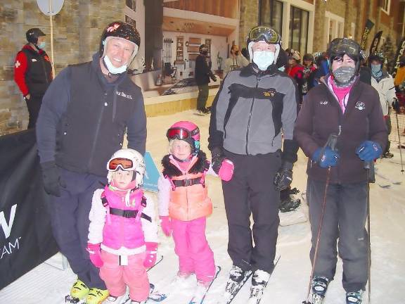 Joe Hession turns on the snow guns at his new, indoor ski resort Two dads who had skied all over the world brought their young daughters to BIG Snow (Photo by Dr. John T. Whiting)