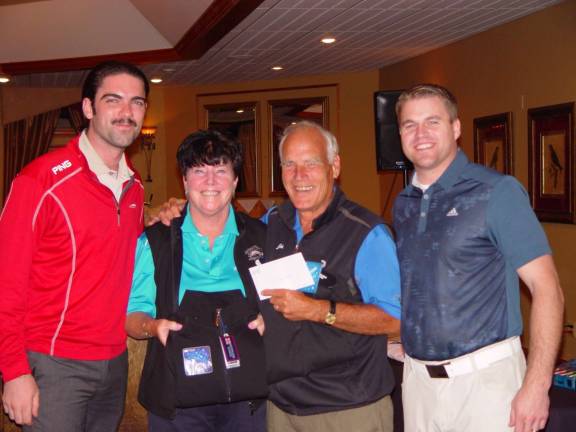Crystal Cup Couple&#xfe;&#xc4;&#xf4;s Division Winners, Buffy &amp; John Whiting with Event Coordinator Eric Wefer and GM Dan Hintzen
