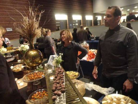 Harvest Fest raises funds for the Growing Stage Children's Theater Rich and Kate Hashway, owners of Newton's Krave Cafe, serve a variety of specialties.